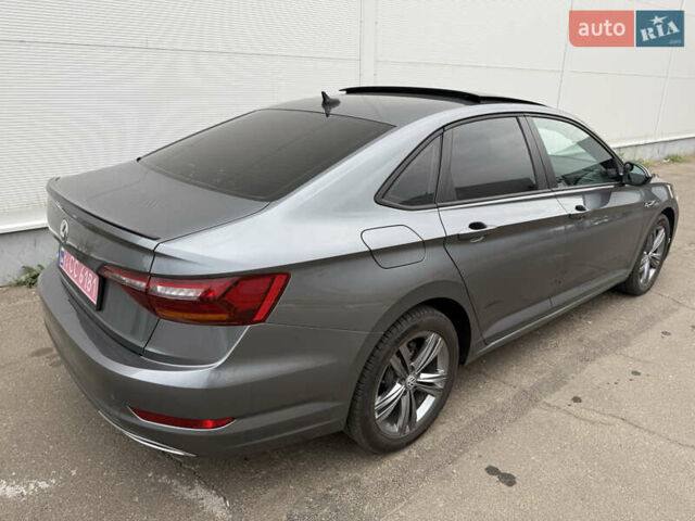 Сірий Фольксваген Джетта, об'ємом двигуна 1.4 л та пробігом 185 тис. км за 13999 $, фото 1 на Automoto.ua
