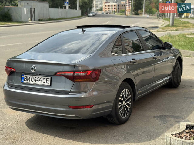 Серый Фольксваген Джетта, объемом двигателя 1.4 л и пробегом 99 тыс. км за 17777 $, фото 4 на Automoto.ua