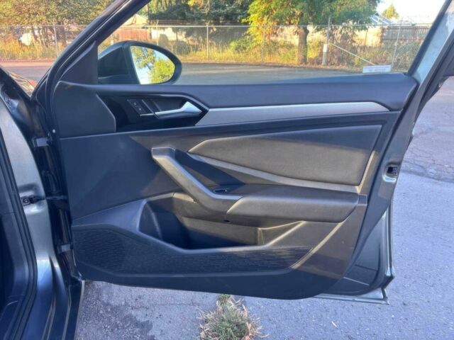 Сірий Фольксваген Джетта, об'ємом двигуна 1.4 л та пробігом 31 тис. км за 11000 $, фото 9 на Automoto.ua