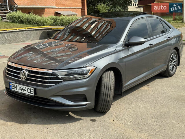 Серый Фольксваген Джетта, объемом двигателя 1.4 л и пробегом 99 тыс. км за 17777 $, фото 5 на Automoto.ua