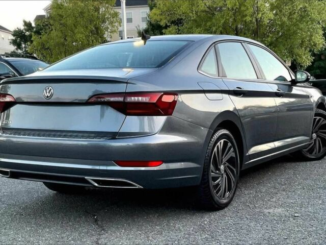 Серый Фольксваген Джетта, объемом двигателя 1.4 л и пробегом 39 тыс. км за 3950 $, фото 2 на Automoto.ua