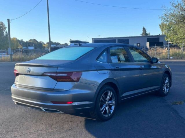 Сірий Фольксваген Джетта, об'ємом двигуна 1.4 л та пробігом 31 тис. км за 11000 $, фото 3 на Automoto.ua