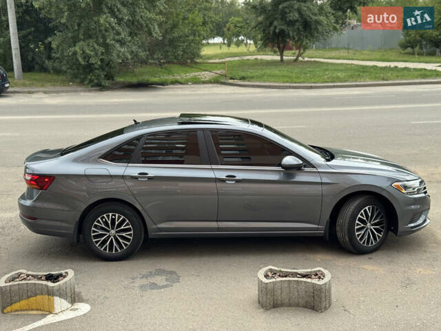 Серый Фольксваген Джетта, объемом двигателя 1.4 л и пробегом 99 тыс. км за 17777 $, фото 7 на Automoto.ua
