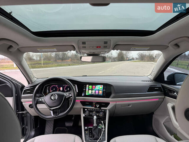 Сірий Фольксваген Джетта, об'ємом двигуна 1.4 л та пробігом 103 тис. км за 15950 $, фото 1 на Automoto.ua