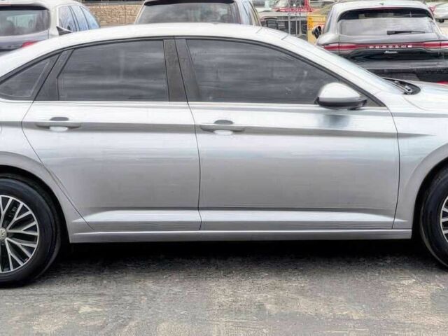 Серый Фольксваген Джетта, объемом двигателя 1.4 л и пробегом 44 тыс. км за 11500 $, фото 4 на Automoto.ua