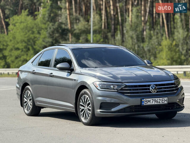 Сірий Фольксваген Джетта, об'ємом двигуна 1.4 л та пробігом 60 тис. км за 16999 $, фото 2 на Automoto.ua