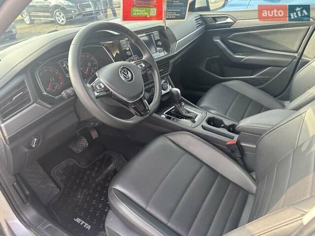 Сірий Фольксваген Джетта, об'ємом двигуна 1.4 л та пробігом 126 тис. км за 13900 $, фото 5 на Automoto.ua