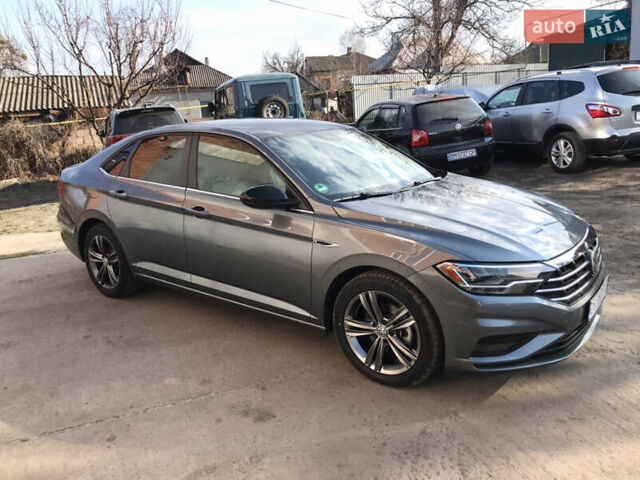 Серый Фольксваген Джетта, объемом двигателя 1.4 л и пробегом 55 тыс. км за 16999 $, фото 1 на Automoto.ua