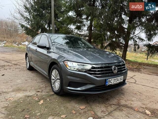 Сірий Фольксваген Джетта, об'ємом двигуна 1.4 л та пробігом 87 тис. км за 13500 $, фото 2 на Automoto.ua