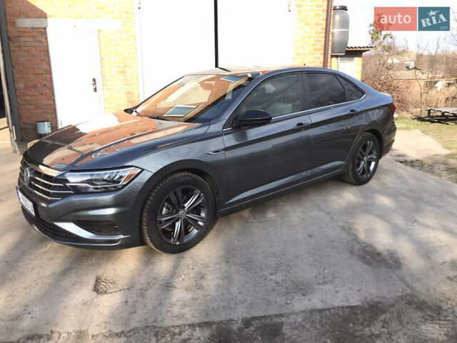 Серый Фольксваген Джетта, объемом двигателя 1.4 л и пробегом 55 тыс. км за 16999 $, фото 5 на Automoto.ua