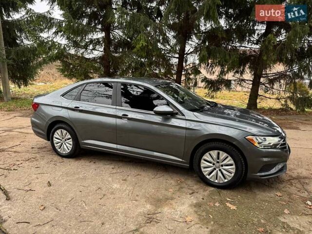 Сірий Фольксваген Джетта, об'ємом двигуна 1.4 л та пробігом 87 тис. км за 13500 $, фото 11 на Automoto.ua