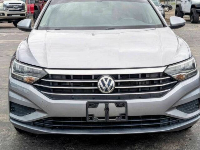 Серый Фольксваген Джетта, объемом двигателя 1.4 л и пробегом 44 тыс. км за 11500 $, фото 1 на Automoto.ua