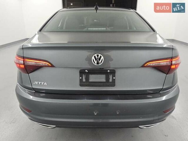Серый Фольксваген Джетта, объемом двигателя 1.4 л и пробегом 112 тыс. км за 4400 $, фото 5 на Automoto.ua