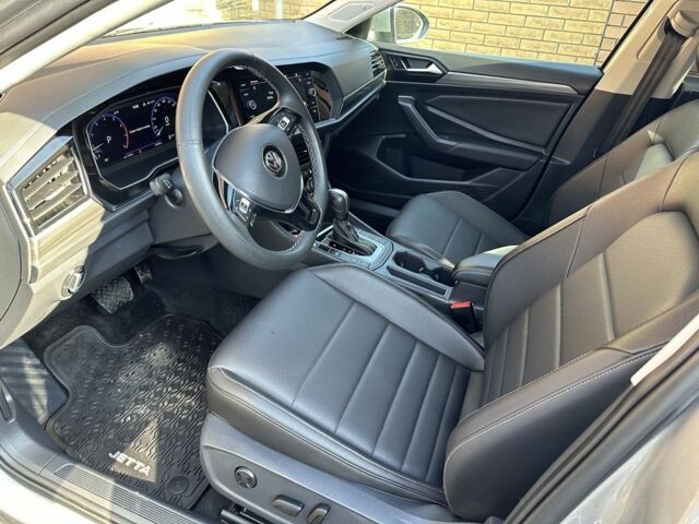 Сірий Фольксваген Джетта, об'ємом двигуна 1.4 л та пробігом 54 тис. км за 19000 $, фото 4 на Automoto.ua