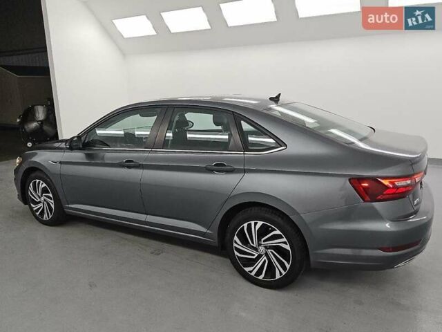 Серый Фольксваген Джетта, объемом двигателя 1.4 л и пробегом 112 тыс. км за 4400 $, фото 1 на Automoto.ua