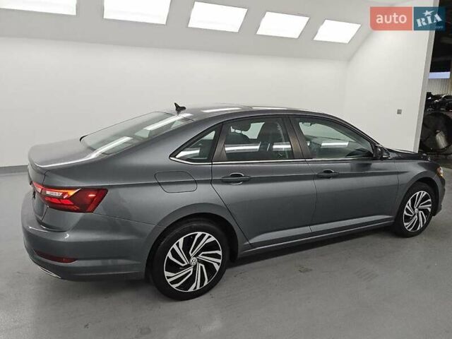 Серый Фольксваген Джетта, объемом двигателя 1.4 л и пробегом 112 тыс. км за 4400 $, фото 2 на Automoto.ua