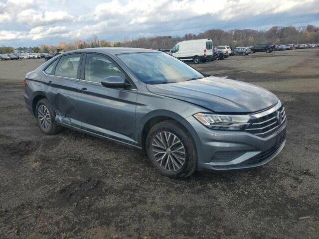 Серый Фольксваген Джетта, объемом двигателя 1.4 л и пробегом 28 тыс. км за 4000 $, фото 3 на Automoto.ua