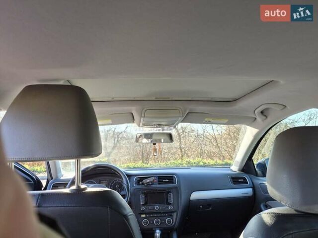 Синій Фольксваген Джетта, об'ємом двигуна 1.39 л та пробігом 188 тис. км за 9600 $, фото 9 на Automoto.ua