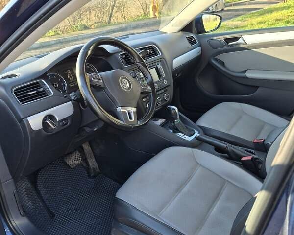 Синій Фольксваген Джетта, об'ємом двигуна 1.39 л та пробігом 188 тис. км за 9600 $, фото 5 на Automoto.ua