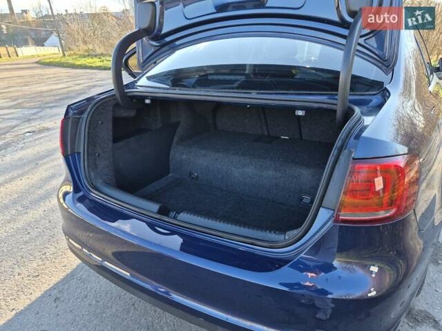 Синій Фольксваген Джетта, об'ємом двигуна 1.39 л та пробігом 188 тис. км за 9600 $, фото 7 на Automoto.ua
