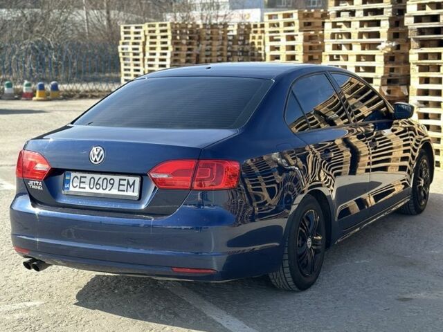 Фольксваген Джетта 2013 в Кицмане на Automoto.ua Синий Фольксваген Джетта, объемом двигателя 2 л и пробегом 160 тыс. км за 9600 $, фото 7 на Automoto.ua