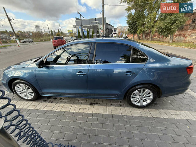 Фольксваген Джетта 2014 в Кропивницком (Кировограде) на Automoto.ua Синий Фольксваген Джетта, объемом двигателя 1.8 л и пробегом 113 тыс. км за 10700 $, фото 4 на Automoto.ua