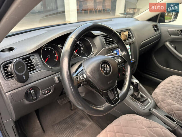 Синий Фольксваген Джетта, объемом двигателя 1.4 л и пробегом 236 тыс. км за 7999 $, фото 33 на Automoto.ua