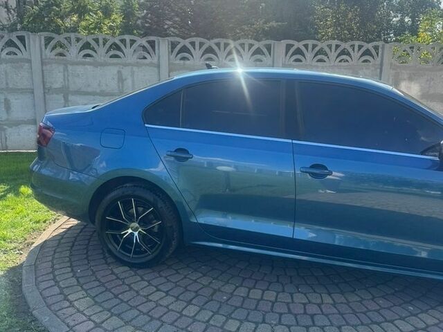 Синій Фольксваген Джетта, об'ємом двигуна 1.4 л та пробігом 135 тис. км за 10000 $, фото 5 на Automoto.ua
