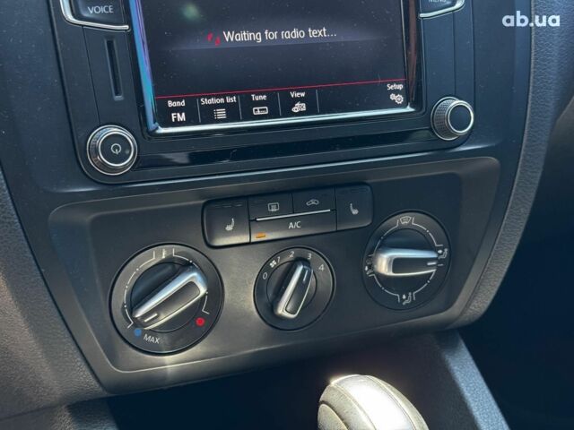 Синій Фольксваген Джетта, об'ємом двигуна 1.4 л та пробігом 93 тис. км за 11790 $, фото 17 на Automoto.ua