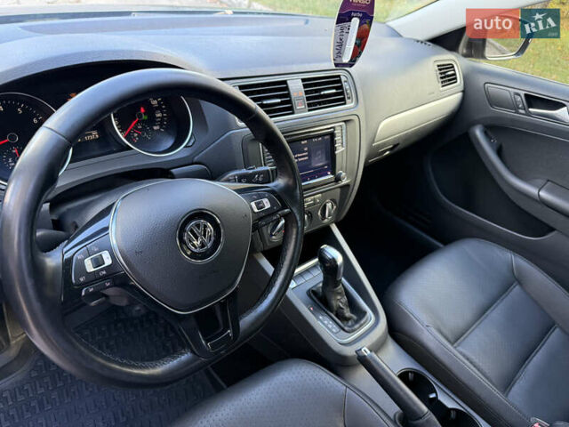 Синій Фольксваген Джетта, об'ємом двигуна 1.4 л та пробігом 100 тис. км за 9500 $, фото 15 на Automoto.ua