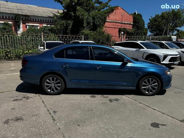 Синій Фольксваген Джетта, об'ємом двигуна 1.4 л та пробігом 93 тис. км за 11790 $, фото 7 на Automoto.ua