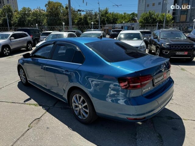 Синій Фольксваген Джетта, об'ємом двигуна 1.4 л та пробігом 93 тис. км за 11790 $, фото 4 на Automoto.ua