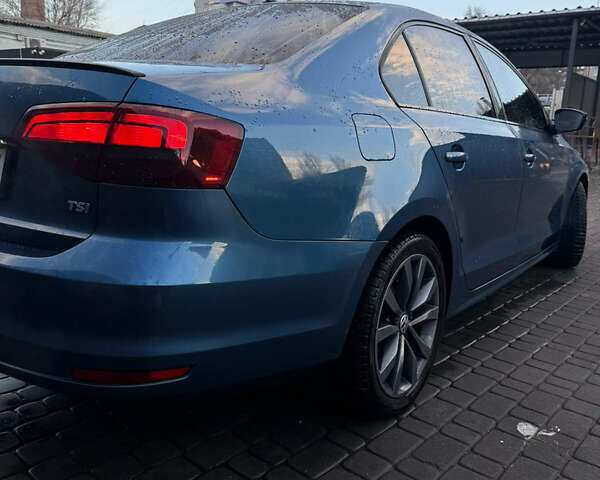 Синий Фольксваген Джетта, объемом двигателя 1.4 л и пробегом 77 тыс. км за 11800 $, фото 6 на Automoto.ua