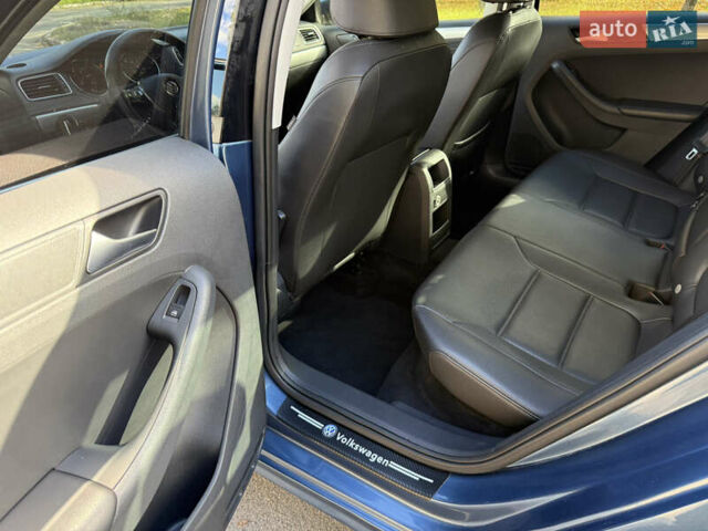 Синій Фольксваген Джетта, об'ємом двигуна 1.4 л та пробігом 100 тис. км за 9500 $, фото 17 на Automoto.ua