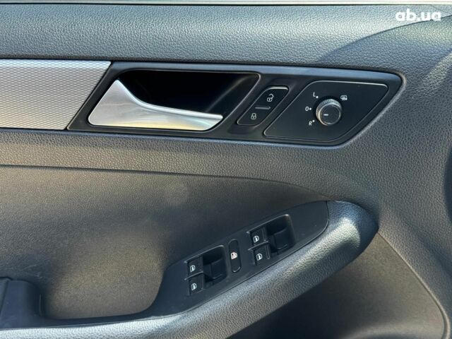 Синій Фольксваген Джетта, об'ємом двигуна 1.4 л та пробігом 93 тис. км за 11790 $, фото 11 на Automoto.ua