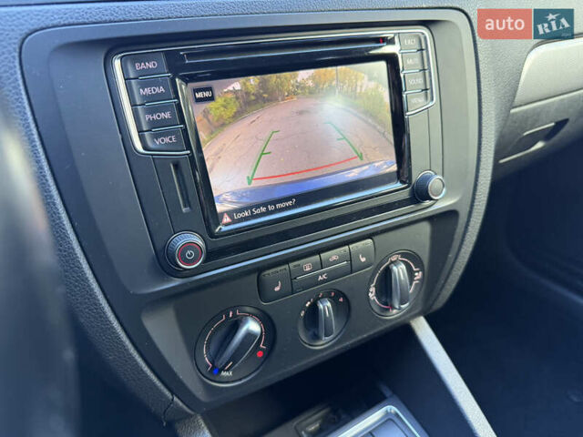 Синій Фольксваген Джетта, об'ємом двигуна 1.4 л та пробігом 100 тис. км за 9500 $, фото 24 на Automoto.ua