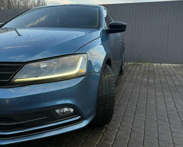 Синий Фольксваген Джетта, объемом двигателя 1.4 л и пробегом 77 тыс. км за 11800 $, фото 4 на Automoto.ua