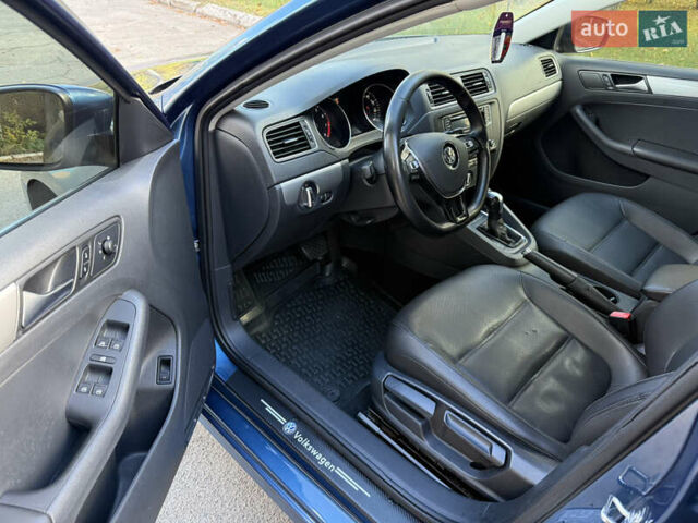 Синій Фольксваген Джетта, об'ємом двигуна 1.4 л та пробігом 100 тис. км за 9500 $, фото 12 на Automoto.ua