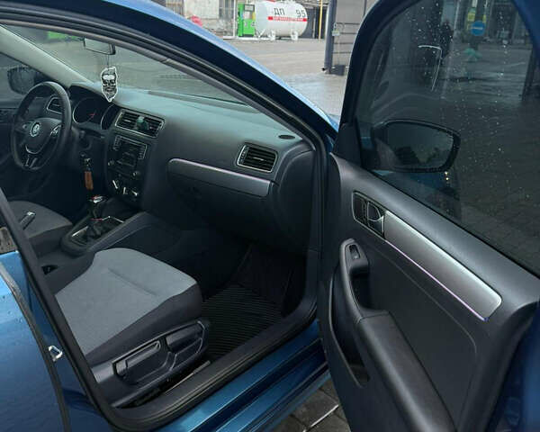 Синий Фольксваген Джетта, объемом двигателя 1.4 л и пробегом 77 тыс. км за 11800 $, фото 7 на Automoto.ua