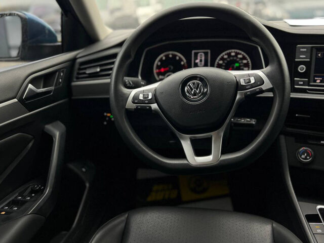 Синий Фольксваген Джетта, объемом двигателя 1.4 л и пробегом 99 тыс. км за 13600 $, фото 11 на Automoto.ua