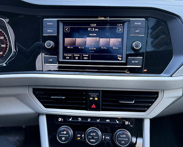 Синій Фольксваген Джетта, об'ємом двигуна 1.4 л та пробігом 99 тис. км за 14800 $, фото 20 на Automoto.ua