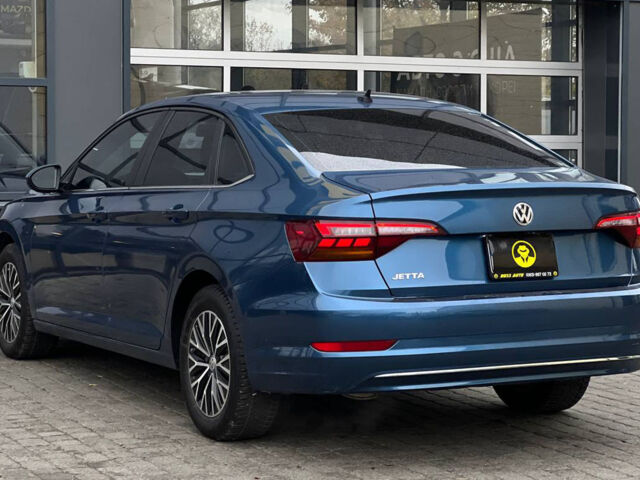 Синий Фольксваген Джетта, объемом двигателя 1.4 л и пробегом 99 тыс. км за 13600 $, фото 3 на Automoto.ua