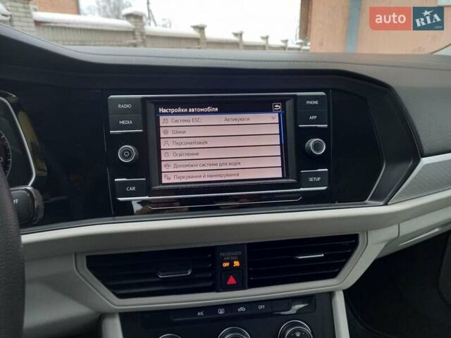 Синий Фольксваген Джетта, объемом двигателя 1.4 л и пробегом 156 тыс. км за 12800 $, фото 31 на Automoto.ua