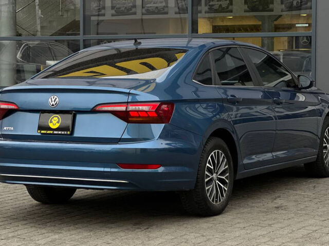 Синий Фольксваген Джетта, объемом двигателя 1.4 л и пробегом 99 тыс. км за 13600 $, фото 5 на Automoto.ua