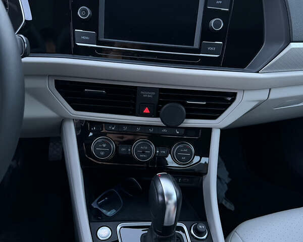 Синий Фольксваген Джетта, объемом двигателя 1.4 л и пробегом 75 тыс. км за 17500 $, фото 23 на Automoto.ua