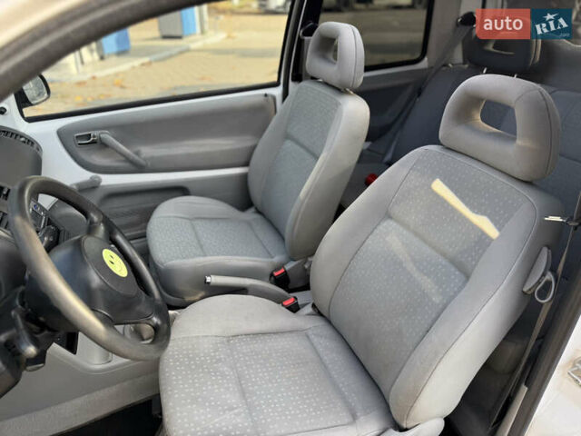 Белый Фольксваген Лупо, объемом двигателя 1 л и пробегом 187 тыс. км за 2700 $, фото 2 на Automoto.ua