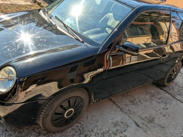 Черный Фольксваген Лупо, объемом двигателя 1.4 л и пробегом 193 тыс. км за 1800 $, фото 5 на Automoto.ua