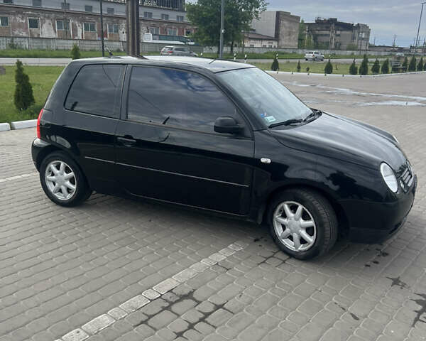 Черный Фольксваген Лупо, объемом двигателя 1 л и пробегом 266 тыс. км за 1600 $, фото 3 на Automoto.ua
