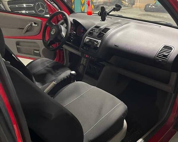 Красный Фольксваген Лупо, объемом двигателя 1 л и пробегом 313 тыс. км за 2400 $, фото 12 на Automoto.ua