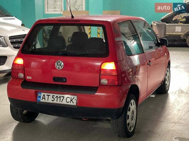Красный Фольксваген Лупо, объемом двигателя 1 л и пробегом 313 тыс. км за 2400 $, фото 1 на Automoto.ua